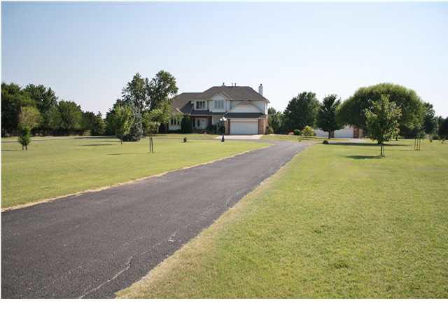 Highly sought after treed acreage in the heart of 