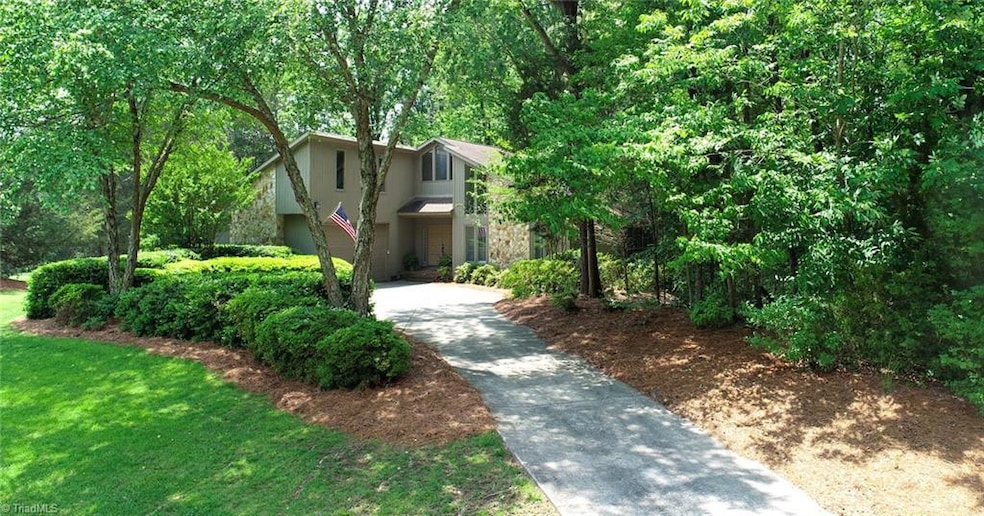 Driveway up to front with additional parking spaces