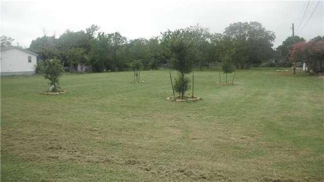 Land/Lot : .68 Acre flat lot  with Pecan trees.