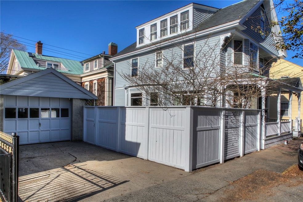 Property showing garage, fence which provides priv