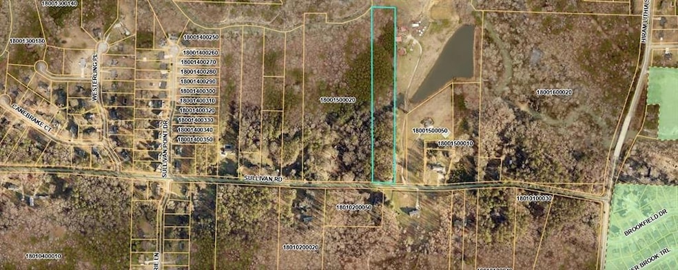 Aerial view of property's location featuring property parcel outlined