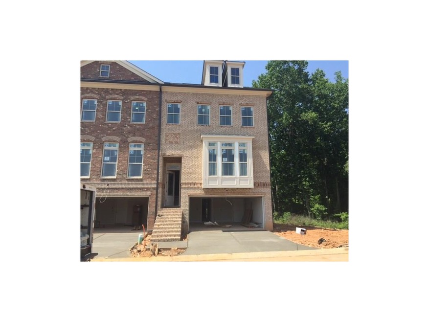 End Unit with bay window. Front elevation. Very Pr