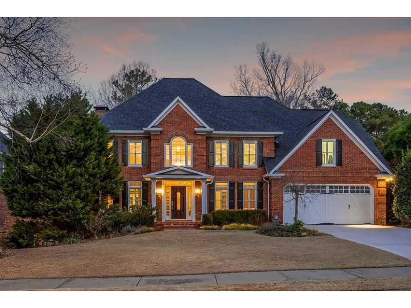 Exterior Front. Beautiful home on golf course.
