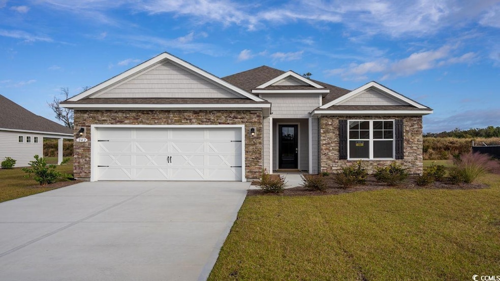 Craftsman-style house featuring a garage and a fro