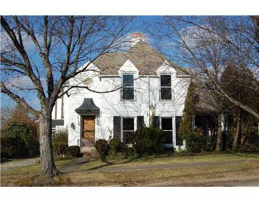 Exterior Front. All brick, slate-roofed, country c