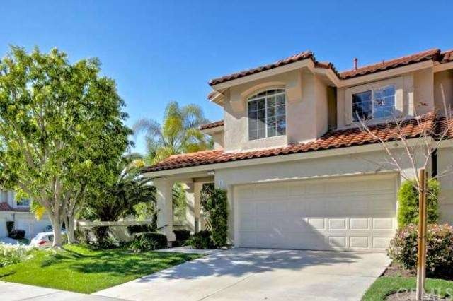 Beautiful end unit home with large driveway and be