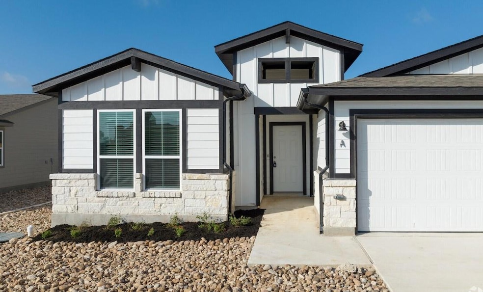 View of front of home with board and batten sidin