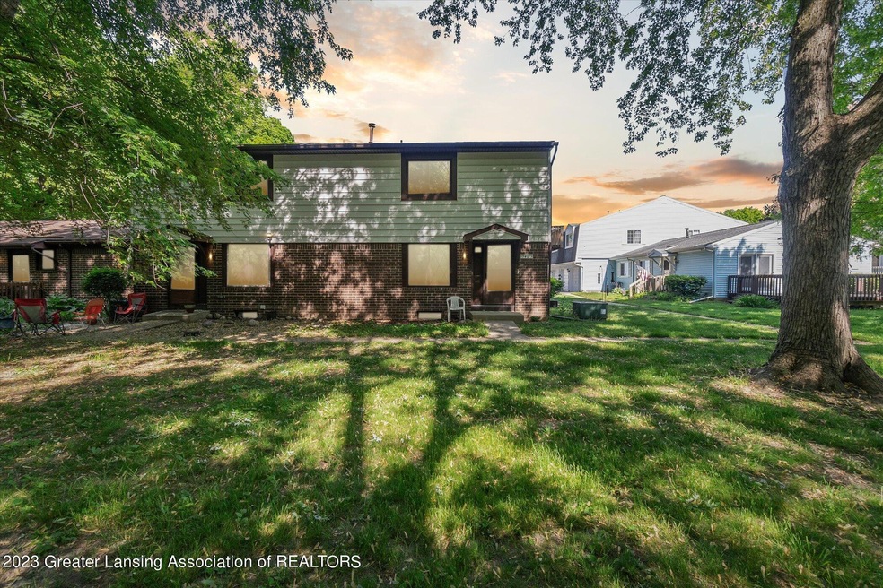 3940 Hunters Ridge Dr unit 3, Lansing, MI 48911 - photo 1