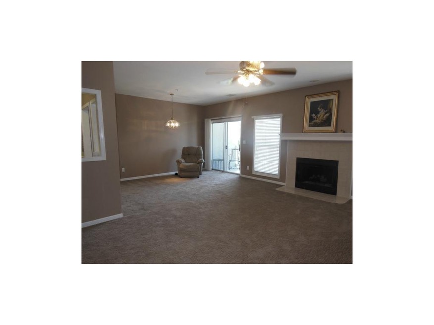 Open living and dining room areas.