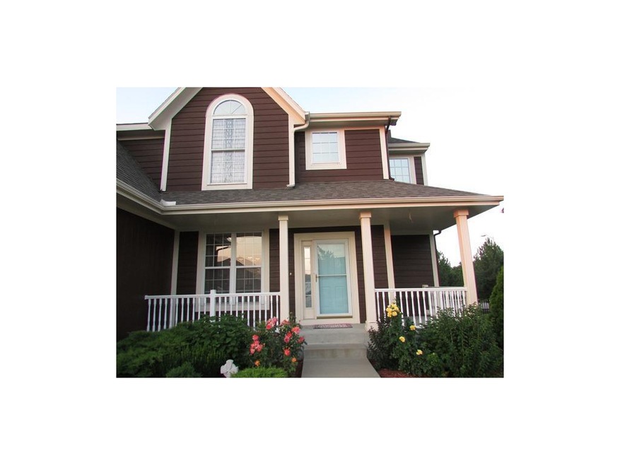 Relax on your new front porch!  Newer Exterior pai