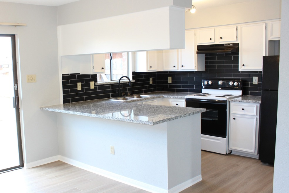 Fully Remodeled 1 story townhome.