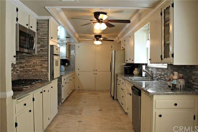 Huge kitchen open to formal and informal dining ar