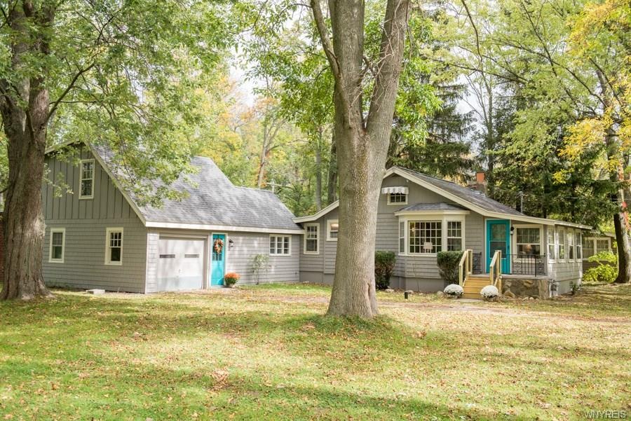 TOTALLY CHARMING EXTERIOR FRESHLY PAINTED...WOODED
