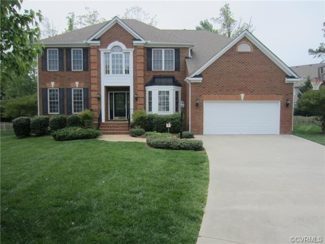 This Brick Front Transitional is Perfectly located