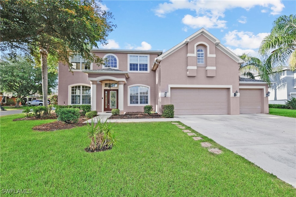Mediterranean / spanish-style home with driveway,