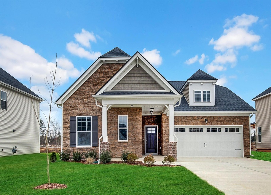 True One level living - storybook cottage feel with extra long drive for visitor parking