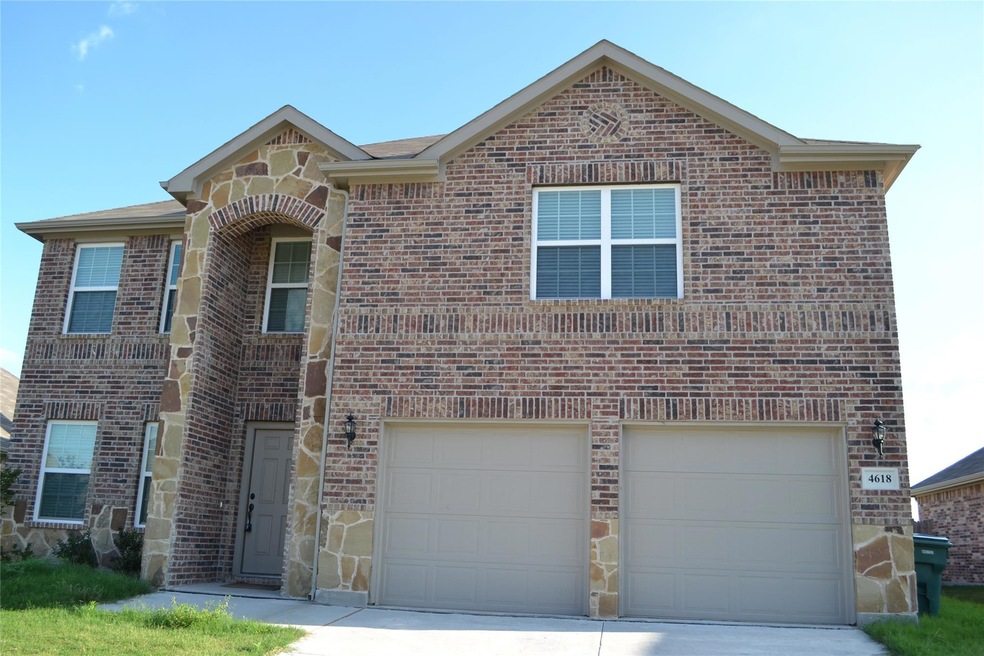 Front of property featuring a garage