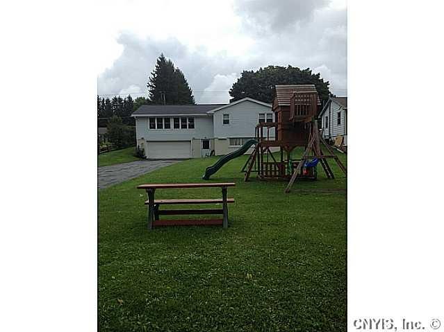 Exterior Front. Large, private yard with plenty of