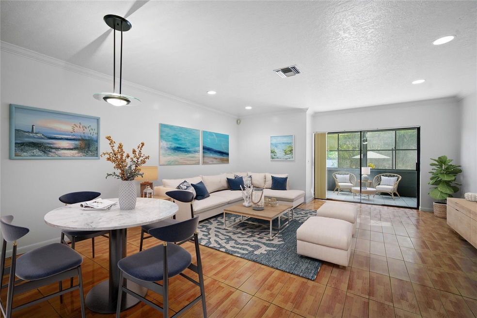 Open Living/Dining Virtually Staged Laminate Floor