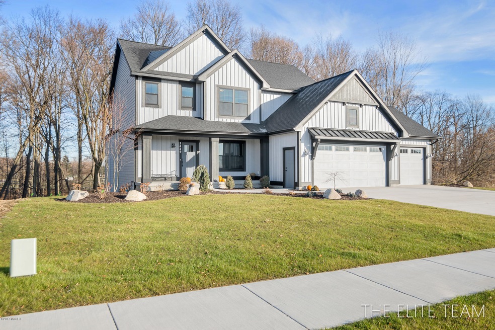 1449 Chase Farms Dr unit 22, Byron Center, MI 49315 - photo 1