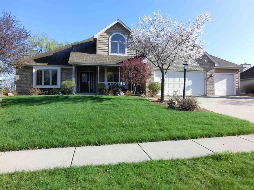 This lovely 2 story home is on a spacious pond lot