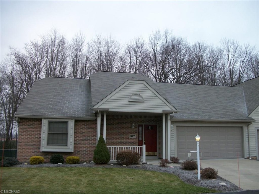Wonderful end unit with brick front, covered porch