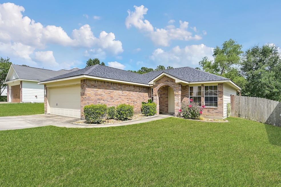 5440 N Buffalo Cir, Willis, TX 77378 - photo 1