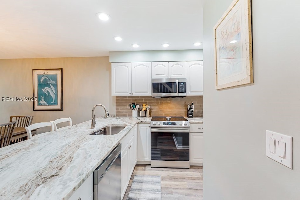 Updated kitchen with stainless Appliances, quartz
