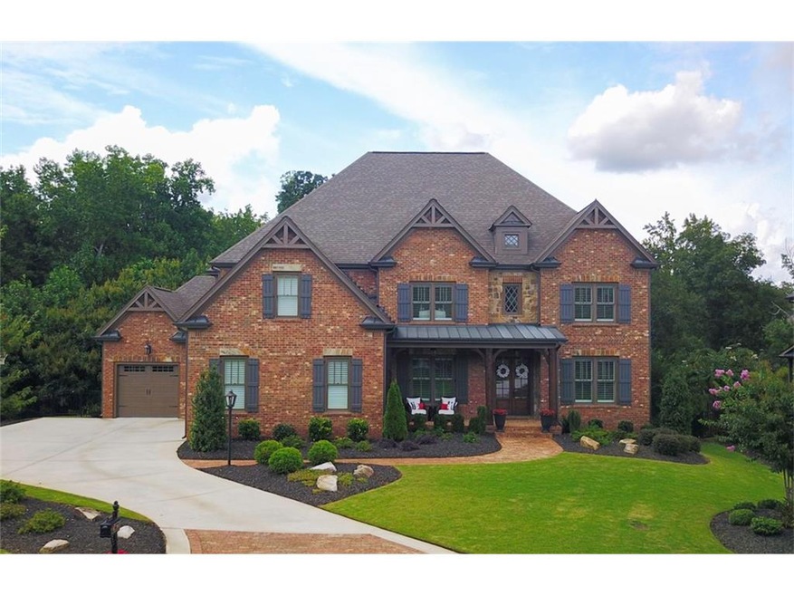 Gorgeous custom home with flat lot/driveway. Upgra