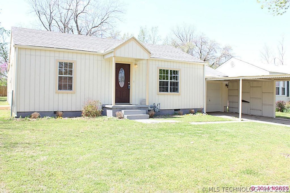Street View of Home with garage and carport