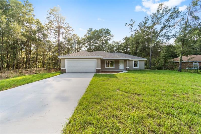 8765 N Tempest Dr, Citrus Springs, FL 34433 - photo 1