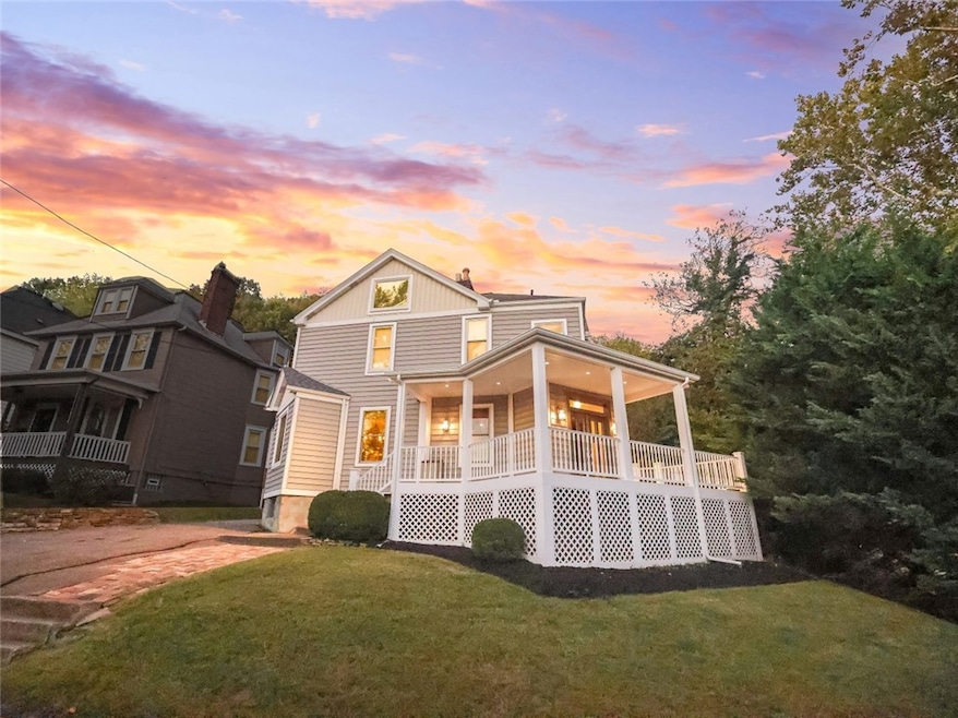 Quintessential farm house complete with lazy wrap around porch.
