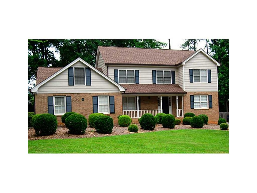 Exterior Front. Well-maintained yard on quiet stre