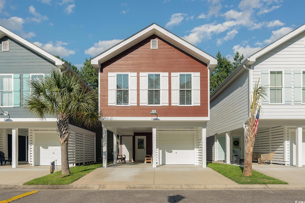 View of front of property with a garage