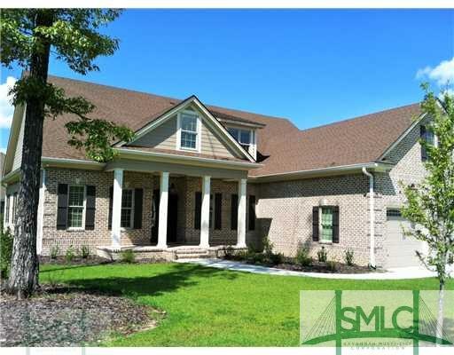 Exterior Front. Brick home on corner lot