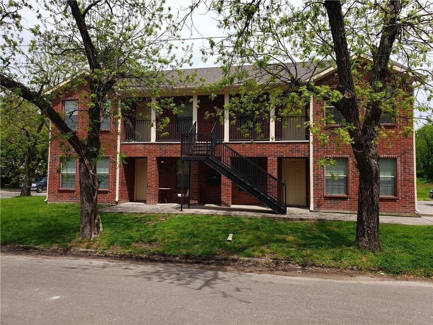 View of front of property with a front yard
