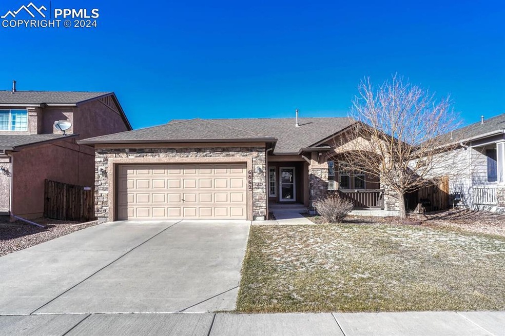 Single story home with a garage