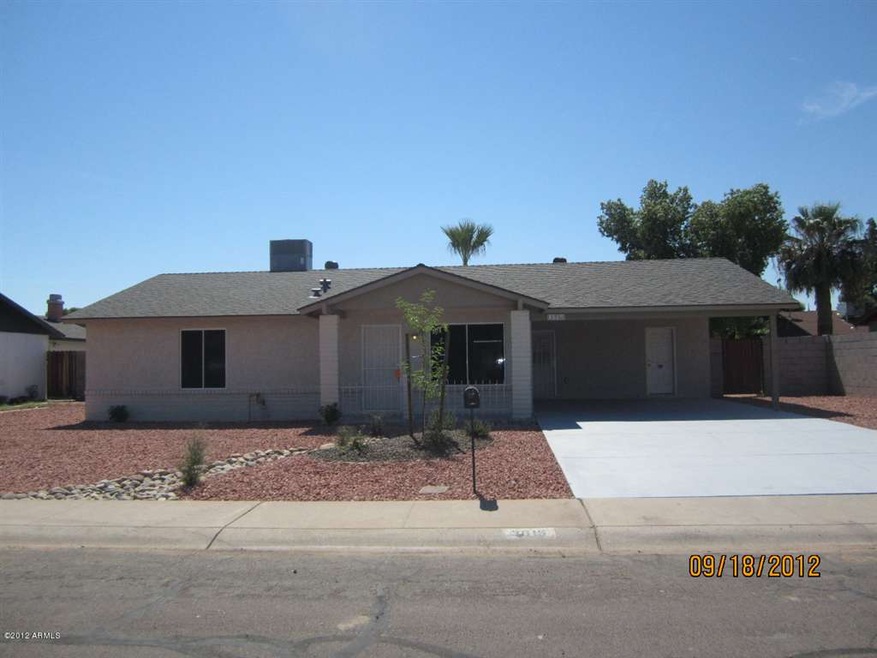 Front view with new landscaping
