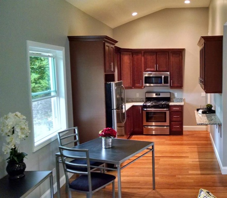 Kitchen with stainless steel appliances and granit