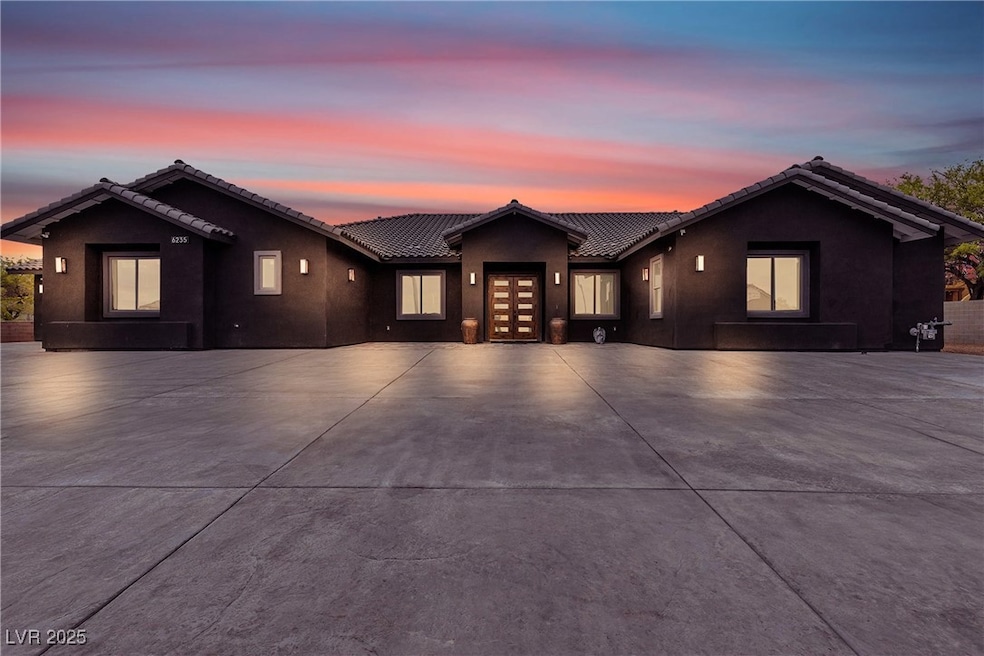 Single story home featuring french doors, a tile r