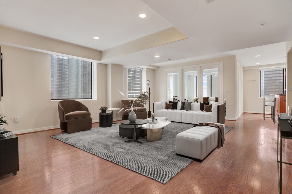 Welcome to Commerce Tower Unit 1702, a stunning 3-