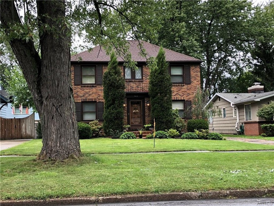 All brick Colonial lovely landscaped yard.