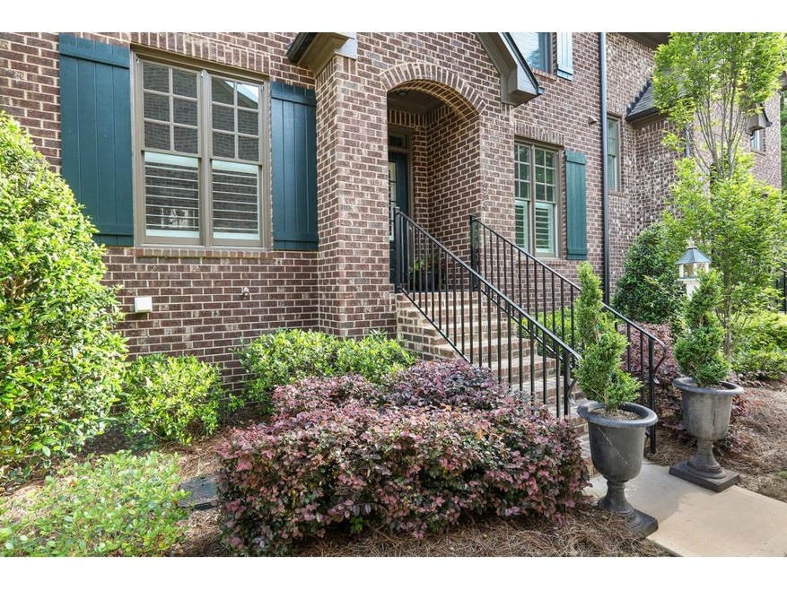 Beautiful brick town home with covered front porch