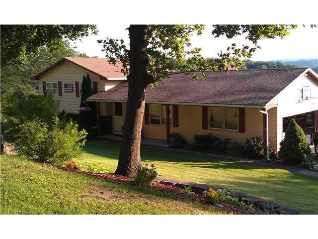 Exterior Front Home sits back off st w/blcktop dri