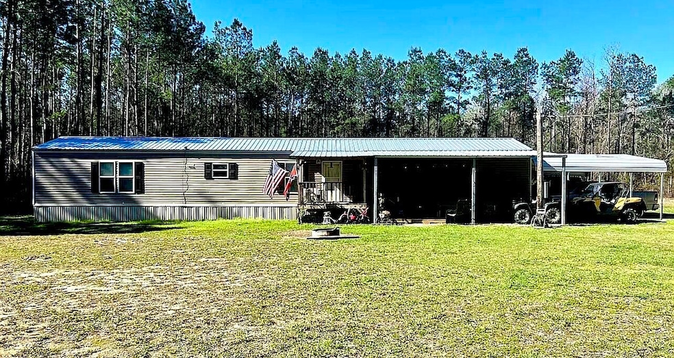 2030 Gravel Pit Rd, Pitkin, LA 70656 - photo 1