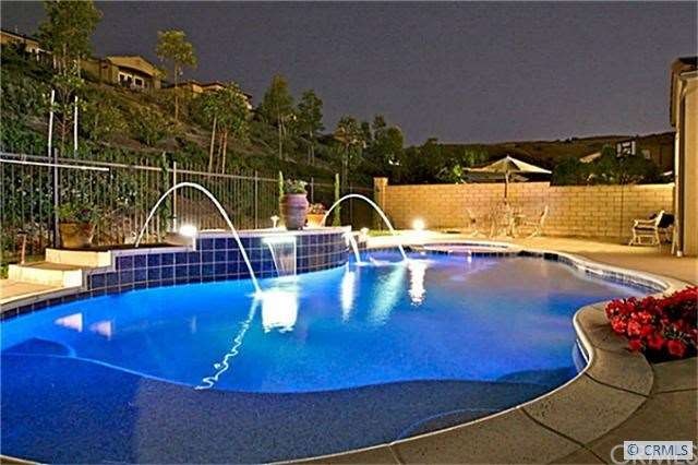 Rare find pool home in Quail Hill with double mast