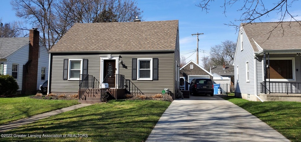 557 S Dexter Dr, Lansing, MI 48910 - photo 1