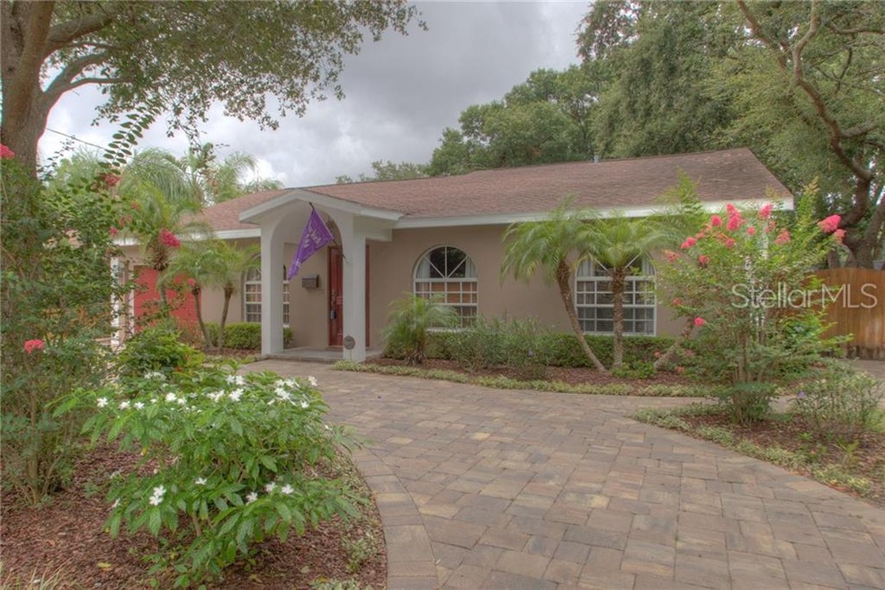 Front exterior with circular drive