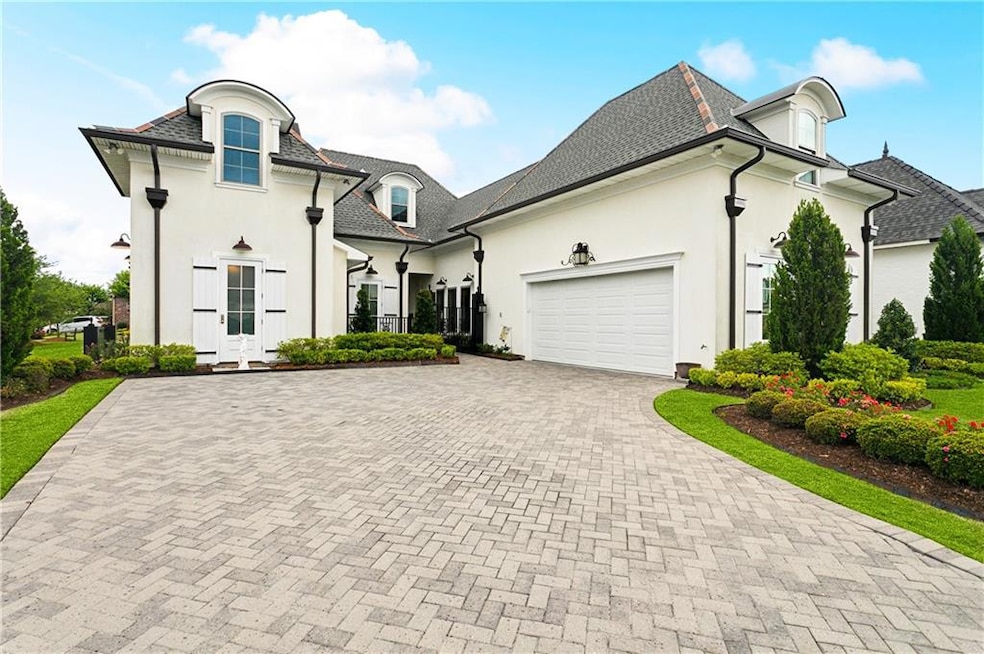 Nestled on a corner lot in Maison Du Lac with plen