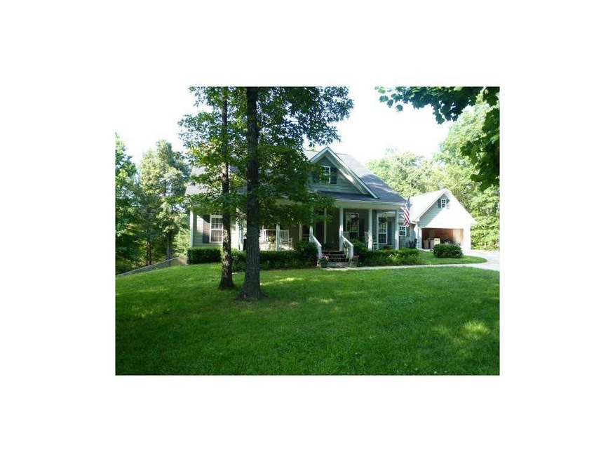 Exterior Front. Front view of house with rocking c